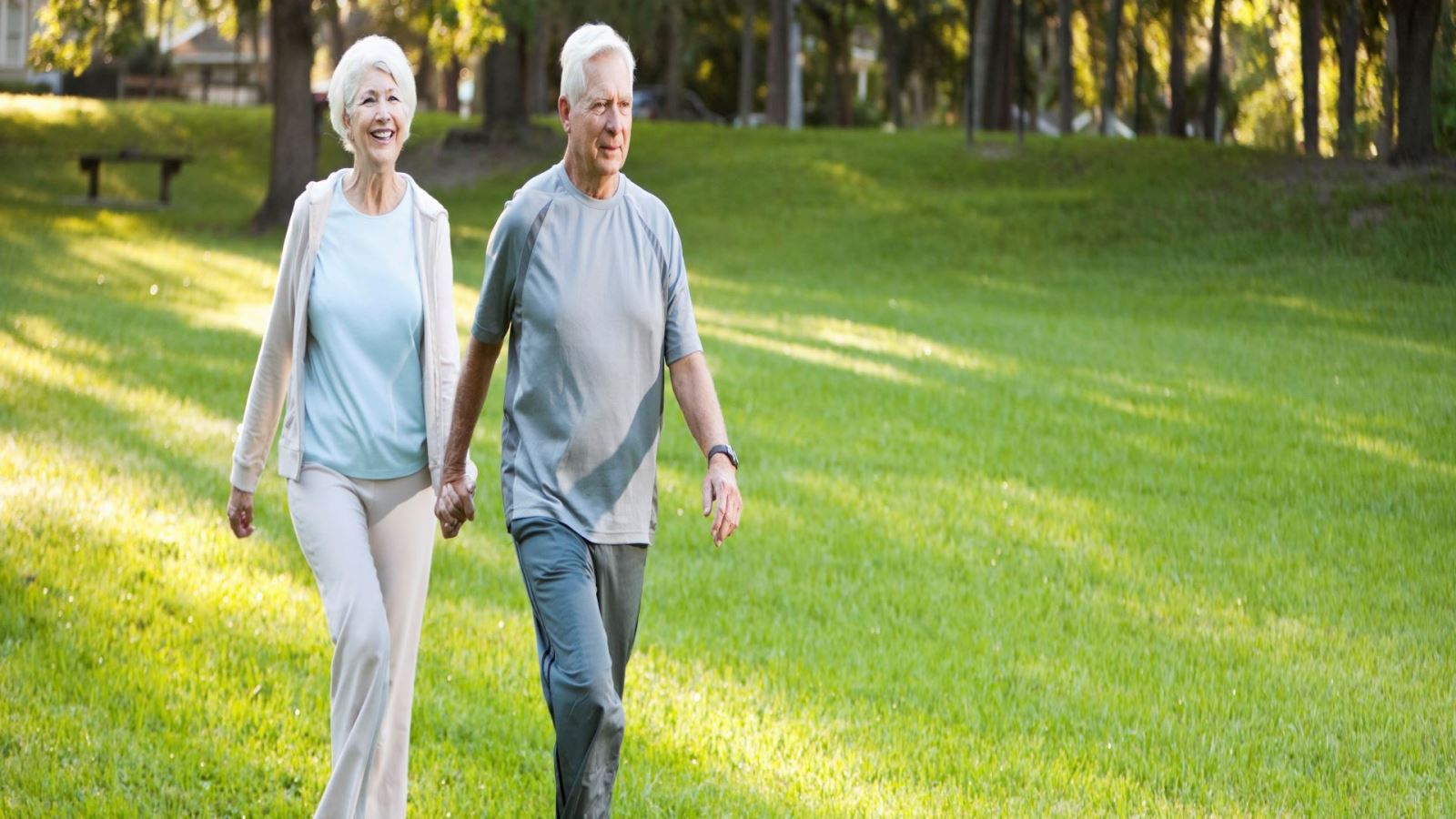 Couple Walking in Field