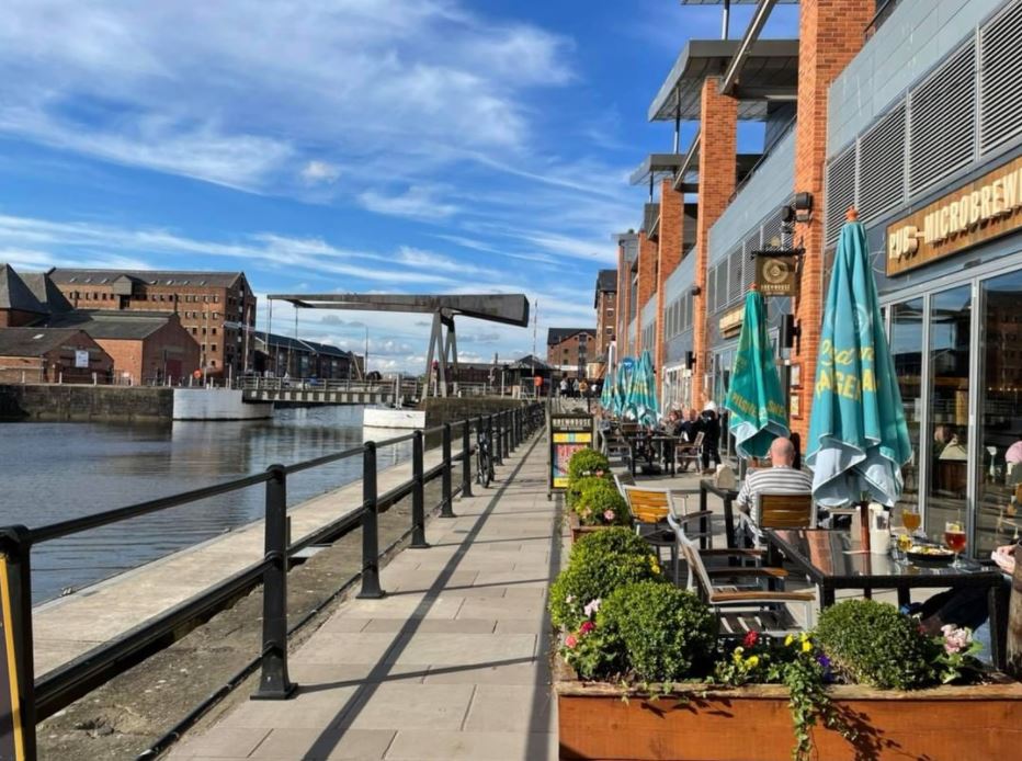 brewhouse seating next to canal
