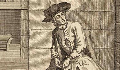 A black and white woodcut illustration of a man in a frock coat and a tricorn hat sitting in a prison cell with his hands in handcuffs