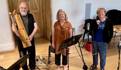Ypotryll band stand with their medieval musical instruments