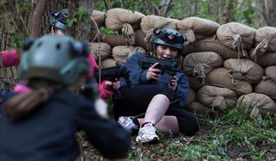 Photo of people playing laser tag