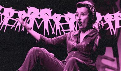 A grainy pink and black image of Viv on stage with a string of paper dolls behind her.