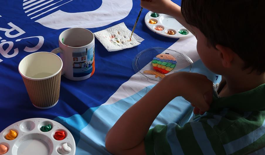 Children enjoying arts and crafts at the museum