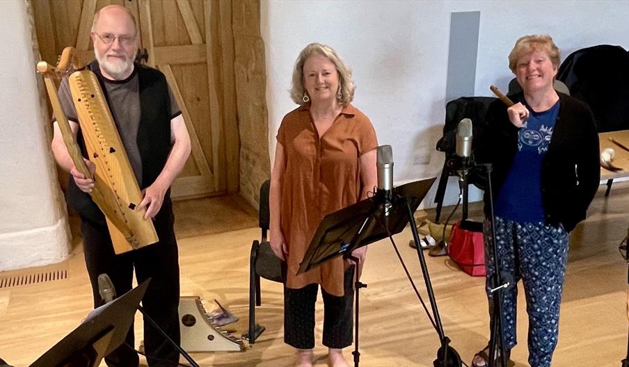 Ypotryll band stand with their medieval musical instruments