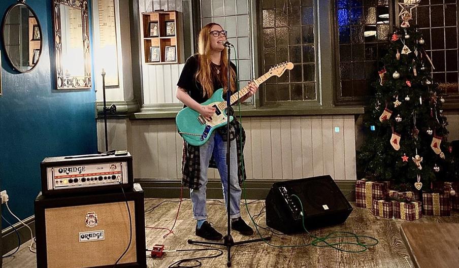 A photo of a live music performance in The Cavern