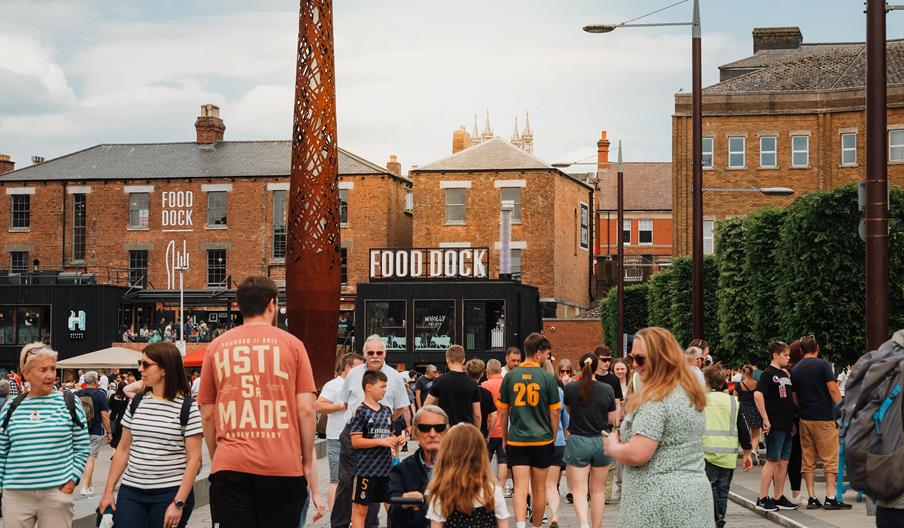 Crowds gather at the Gloucester Food Dock.