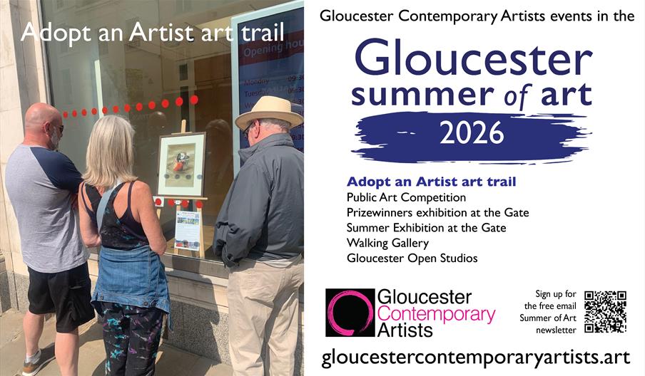 Members of the public looking at an artwork in a city centre business window
