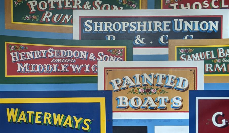 Painted signs at the National Waterways Museum Gloucester