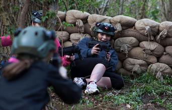 Photo of people playing laser tag