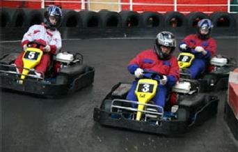 Photo of people racing at JDR Karting