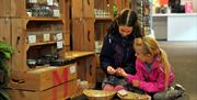 Children exploring the Museum gift shop.