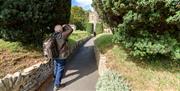 Man taking photo of church