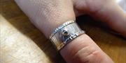 A picture containing one image of a ring that could be made on the sterling silver ring making workshop run in Gloucester, Gloucestershire by Emma Edw