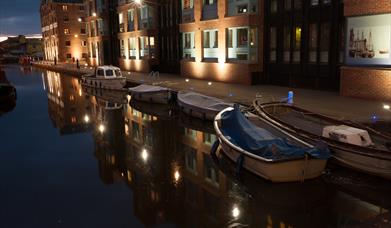 Boats in Gloucester docks at night