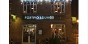 Outside Portivo Lounge at night