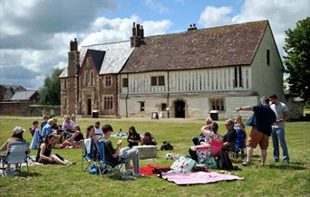 Families enjoying a picnic at Llanthony Secunda Priory